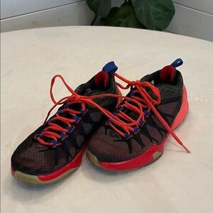 Jordan Kids Black and Red Sneakers with Blue Accents